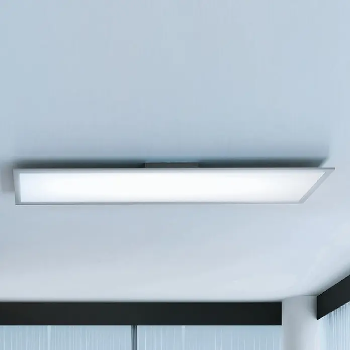 Ledvance Smart+ WiFi LED-Panel Planon Plus - 36 W, L x B x H: 120 x 30 x 5,6 cm, Weiß - Flache, rechteckige LED-Deckenleuchte mit silbernem Rahmen, montiert an einer hellen Decke.