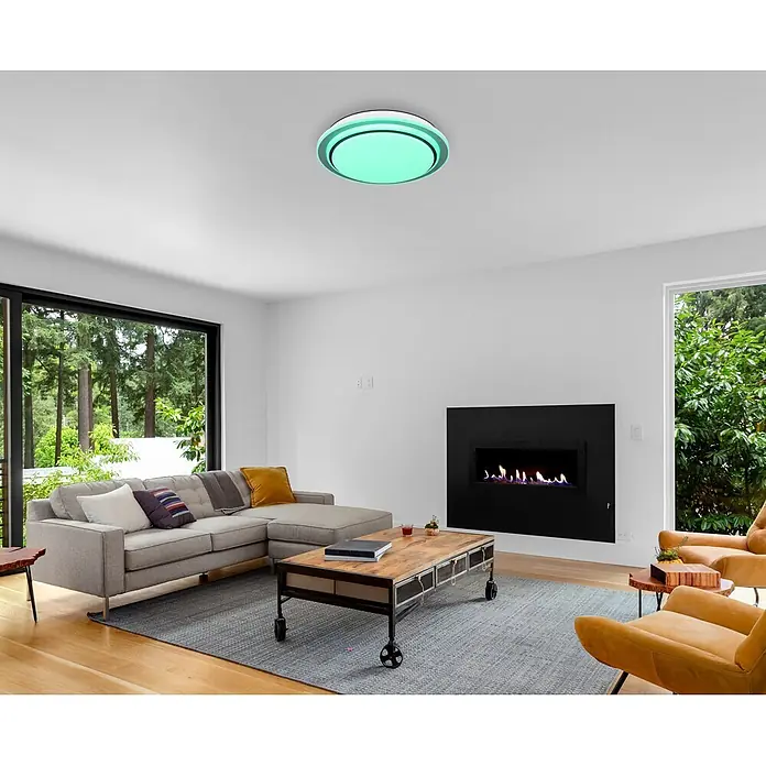 Globo LED-Deckenleuchte rund Foppa - 24 W, Ø x H: 40 x 7 cm, Schwarz - Runde LED-Deckenleuchte, grün leuchtend, in einem modernen Wohnzimmer installiert.