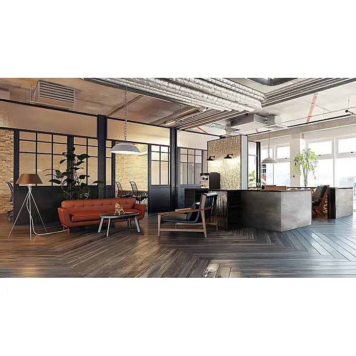 Wallface Wandpaneel 23101 GENESIS Grey Wandverkleidung in Marmor Optik matt grau 2,60 m2 - beige, 2.600 x 1.000 mm - Modernes Industrie-Büro mit Holzfußboden, orangefarbenem Sofa, dunklem Sessel und Glasabtrennungen.