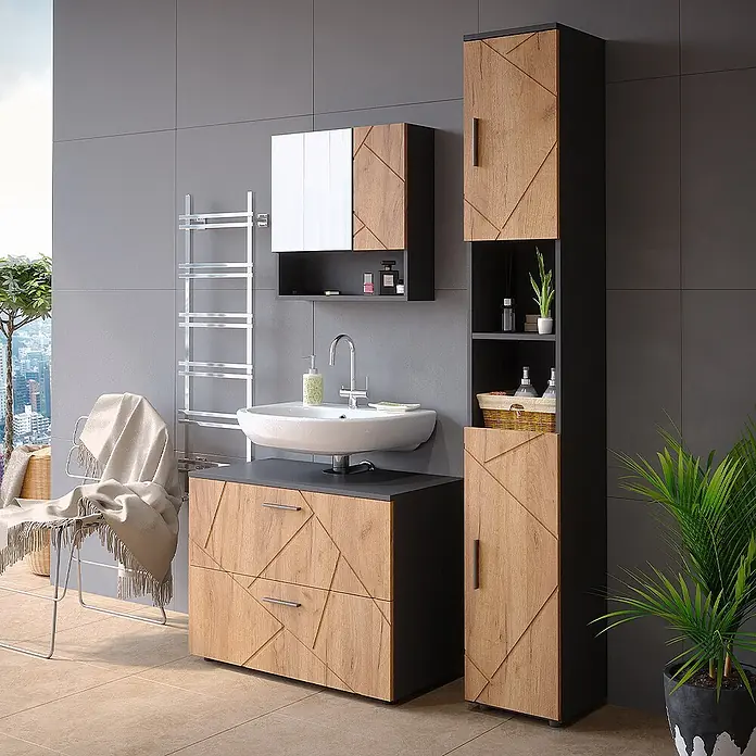 Vicco Badmöbel-Set Irma Goldkraft Eiche 3 Teile, mit Schubladenschrank und Hochschrank - Gesamtbreite Badmöbel: 110 cm, Goldkraft Eiche, Matt - Modernes Badmöbel-Set mit Holzdekor, geometrischem Design, dunkelgrauen Akzenten und weißem Waschbecken im Badezimmer.