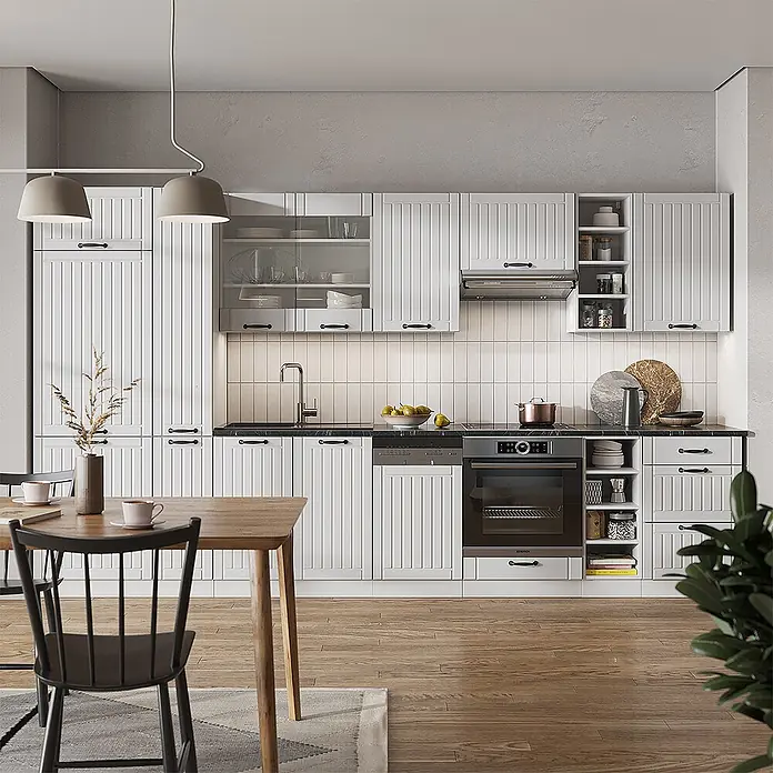 Vicco Küchenzeile Fame-Line Weiß Landhaus/Weiß, AP Eiche - Weiß Landhaus, Ohne Elektrogeräte - Weiße Küche mit vertikal gerillten Schränken, schwarzen Arbeitsplatten und integrierten Geräten.