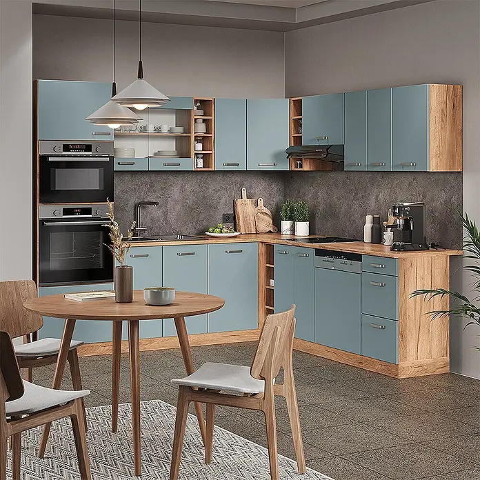 Vicco Eckküche R-Line Blau-Grau/Goldkraft Eiche ohne Arbeitsplatte - Blau-Grau, Ohne Elektrogeräte - Moderne L-förmige Küche mit blau-grauen Schränken und hellen Holzdetails, integrierten Geräten und kleinem Essbereich.