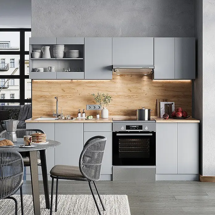 Vicco Küchenzeile R-Line Grau, AP Eiche - Grau, Ohne Elektrogeräte - Moderne Küche mit hellgrauen Schränken, Holzoberflächen und integriertem Backofen.