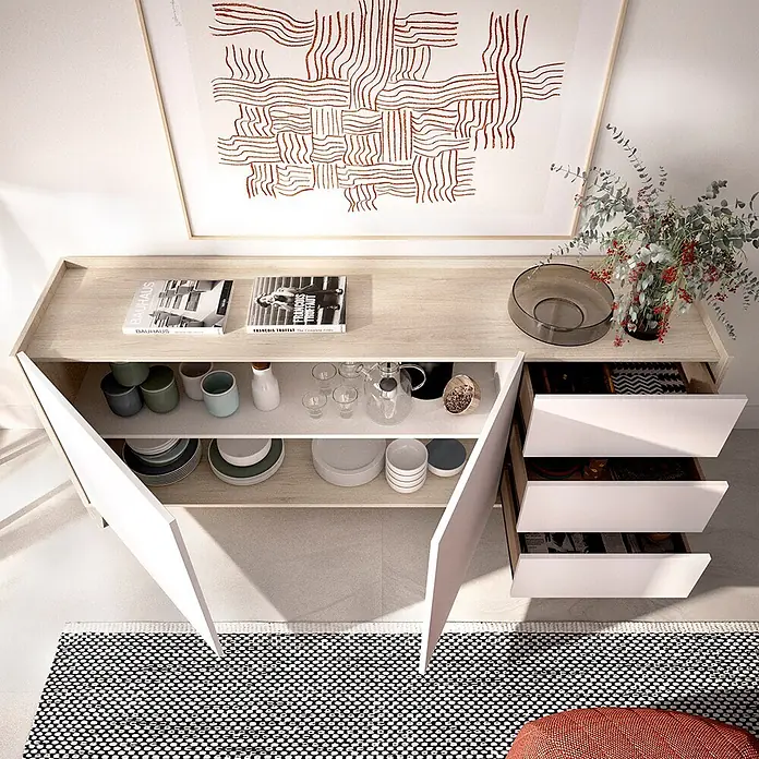 Dekit Bari Aparador - L x An x Al: 40 x 150 x 77,5 cm, Roble Natural/Blanco, Número de cajones: 3 ud., Número de puertas: 2 ud. - Aparador moderno con superficie de madera clara y puertas/cajones blancos, abierto mostrando vajilla y objetos.