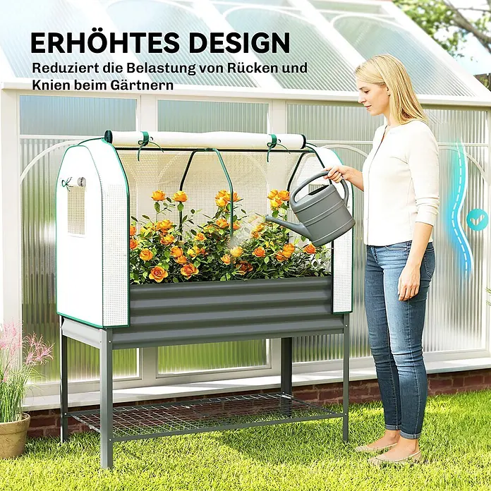 Outsunny Hochbeet Mit Frühbeetaufsatz - Metall, Dunkelgrau - Graues Metall-Hochbeet mit Mini-Gewächshausabdeckung. Eine Frau gießt Pflanzen, was das ergonomische Design für komfortables Gärtnern zeigt.