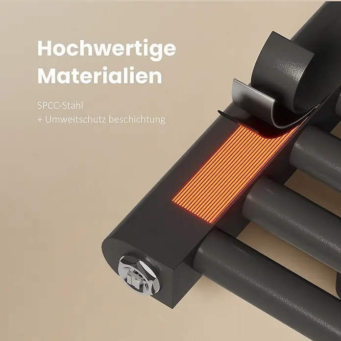 Emke Badheizkörper Rundrohr Thermio TR - B x H: 60 x 120 cm, Anthrazit - Dunkelgraues Heizelement mit orangefarbener Glühspirale im Querschnitt, zeigt SPCC-Stahl und Schutzbeschichtung.