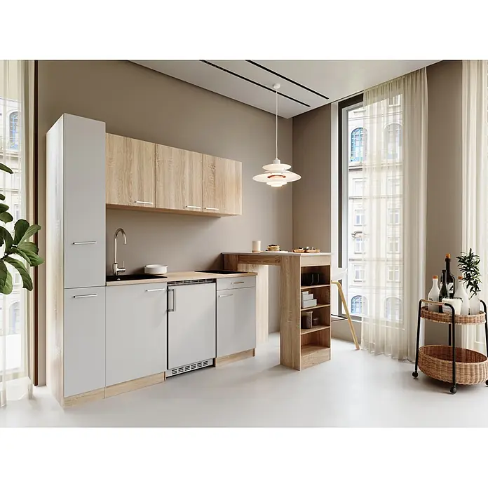 Respekta Küchenzeile Ingrid - Breite: 180 cm, Weiß, Mit Bartisch, Mit Kochfeld + Kühlschrank - Kompakte Küche mit hellen Holz- und grauen Schränken, Spüle, Kochfeld, integriertem Kühlschrank und Frühstückstheke.