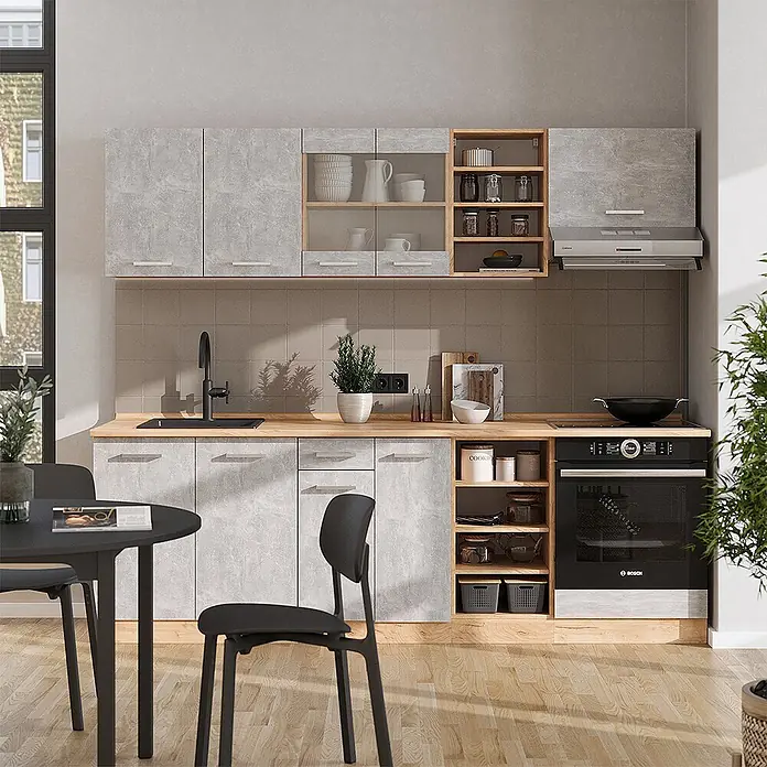 Vicco Küchenzeile R-Line Beton/Goldkraft Eiche, AP Eiche - Beton, Ohne Elektrogeräte - Moderne Küche mit hellgrauen Betonoptik-Schränken, hellen Holztheken und offenen Regalen.