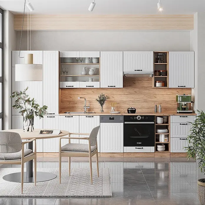 Vicco Küchenzeile Fame-Line Weiß Landhaus ohne Arbeitsplatte - Weiß Landhaus, Ohne Elektrogeräte - Moderne Küche mit weißen Lamellenschränken, Holzarbeitsplatte/Rückwand, integrierten Geräten und kleinem Essbereich.