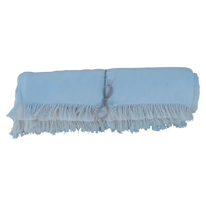 Manta para sofá Multiusos - Textil, Natural - Manta blanca enrollada con flecos y un lazo, ideal como un accesorio elegante para el hogar o para horas acogedoras.