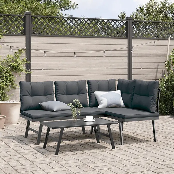 Furnicato Gartenbank pulverbeschichtet Anthrazit - B x T x H: 173 x 118 x 76 cm, Schwarz - Dunkelgraue Outdoor-Loungeset mit L-förmigem Sofa und Couchtisch, auf einer gepflasterten Terrasse.