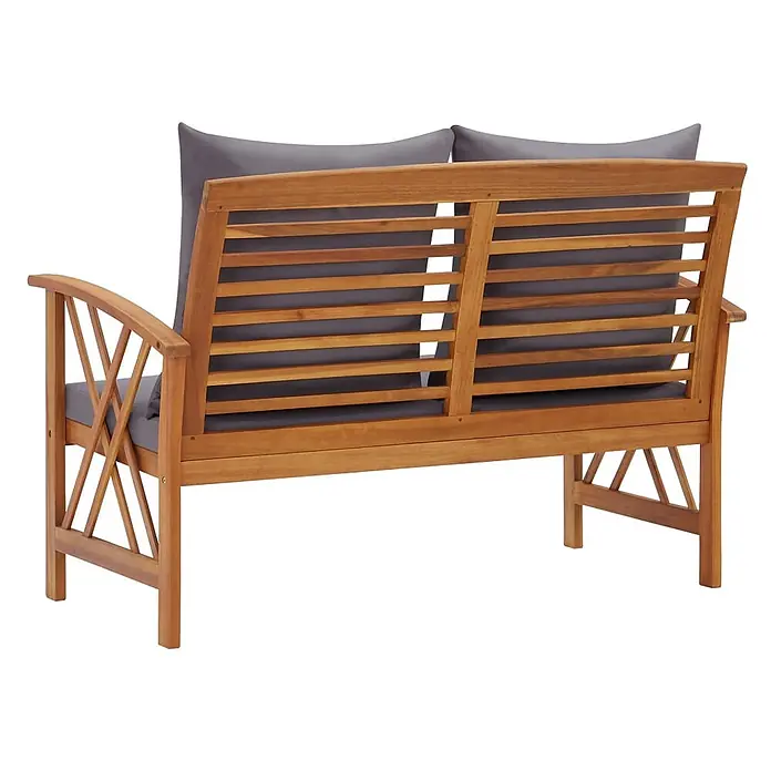 Furnicato Gartenbank Akazien-Massivholz geölt - B x T x H: 119 x 67 x 83 cm, braun und dunkelgrau - Rückansicht einer hellbraunen Holzgartenbank mit Lattenrückenlehne und grauen Kissen.