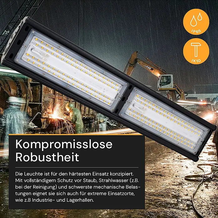 Enovalite LED-Strahler LED-Hallenstrahler - 100 W, 12.000 lm, 5.000 K, IP65 - Schwarze, robuste Industrie-LED-Leuchte mit gelben LEDs, abgebildet in einer rauen, regnerischen Baustellenumgebung.