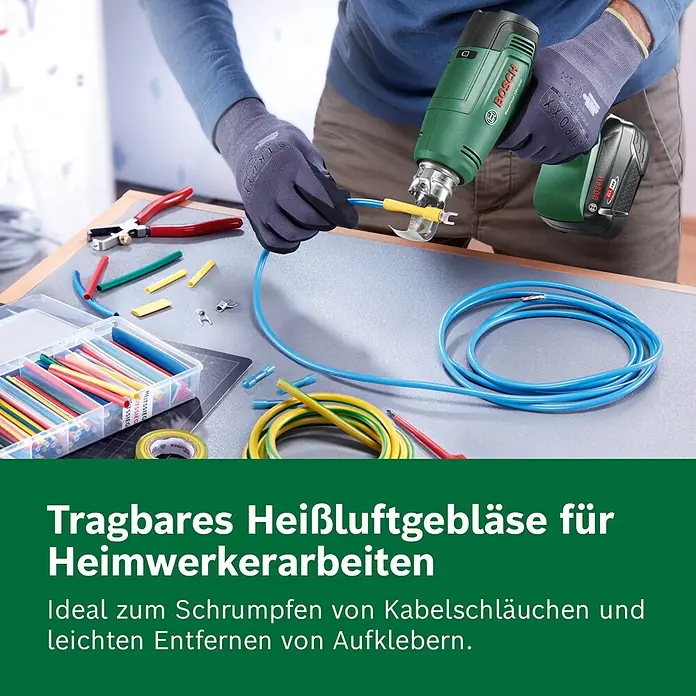 Bosch Power for All 18V Akku-Heißluftgebläse EasyHeat 18V-500 - 18 V, Ohne Akku, Temperaturbereich: 350 °C - 450 °C - Grünes Akku-Heißluftgebläse schrumpft gelbe Kabelhülse auf blauem Kabel. Ideal für Heimwerker.