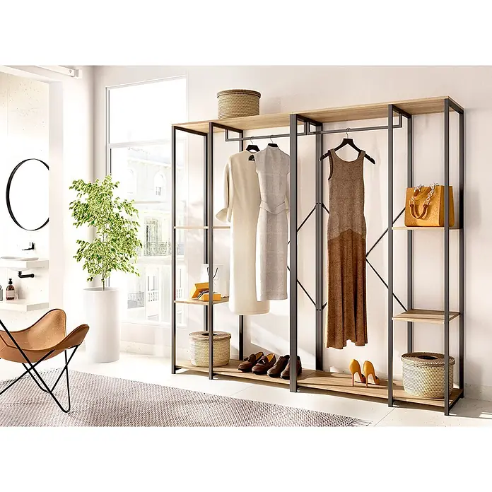 Dekit Armario para ropa Trok - L x An x Al: 40,4 x 180 x 167 cm, Negro/Roble, Acero/Melamina - Sistema de armario abierto con marcos de metal negro y estantes de madera clara, mostrando ropa y accesorios en una habitación moderna.