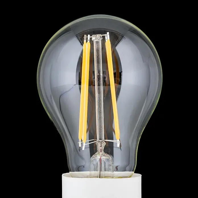 Orion Leuchten LED-Lampe - E27, Dimmbar, Warmweiß, 980 lm, 8 W - Klare Glas-LED-Glühbirne mit sichtbaren gelben Filamenten und einem weißen Sockel.