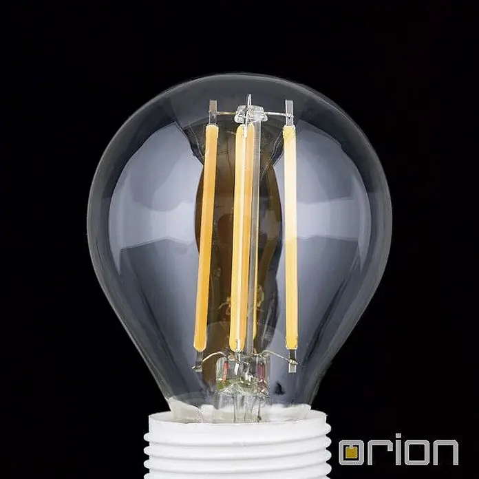 Orion Leuchten LED-Lampe - E14, Dimmbar, Warmweiß, 450 lm, 4,5 W - Klarglas-LED-Filamentlampe mit sichtbaren gelb-orangen Filamenten und weißem Schraubsockel.