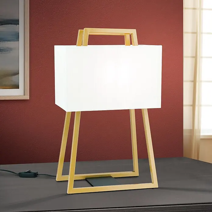 Orion Leuchten Tischleuchte - 40 W, L x B x H: 31 x 19 x 51 cm, E27 - Weiße rechteckige Tischlampe mit goldenem Metallgriff und geometrischem Rahmen auf dunklem Tisch.
