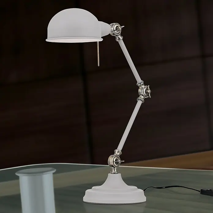 Orion Leuchten Tischleuchte - 40 W, L x B x H: 43 x 17 x 48 cm, E27 - Weiße Gelenk-Schreibtischlampe mit Metallgelenken auf einem Glastisch.