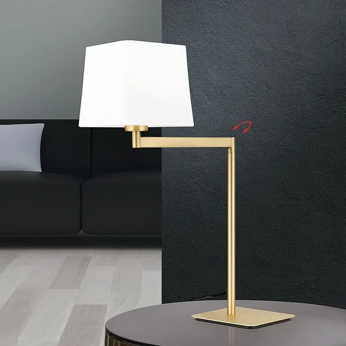 Orion Leuchten Tischleuchte - 40 W, L x B x H: 37,5 x 16 x 53 cm, E27 - Goldfarbene Tischleuchte mit weißem quadratischem Schirm und verstellbarem Arm auf einem runden Tisch.