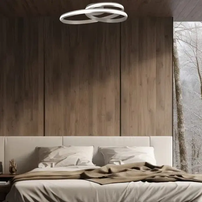 Orion Leuchten LED-Deckenleuchte - L x B x H: 58 x 58 x 12 cm - Moderne weiße LED-Deckenleuchte mit verbundenen Ringen, über einem Bett im Schlafzimmer.