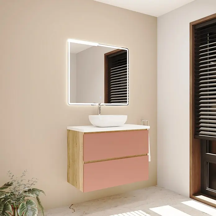 Mueble bajo de lavabo Isa - An x Pr x Al: 90 x 44,6 x 54,5 cm, Rose, Apertura con uñero ingletado 45 grados - Mueble de baño mural con estructura de madera, cajones rosas, lavabo sobre encimera blanco y espejo iluminado.