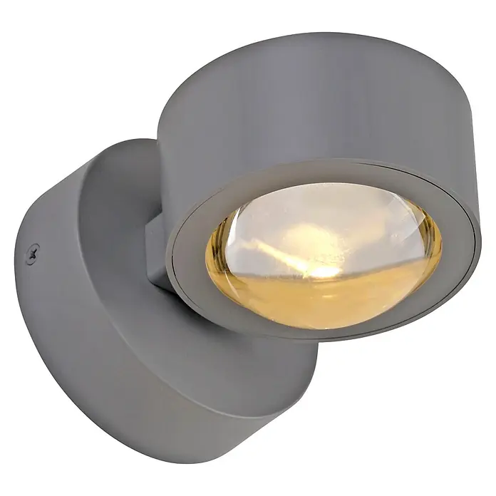 Just Light LED-Wandleuchte Chia -  - Grauer zylindrischer Wandstrahler mit runder Basis und gewölbter Linse, die warmes Licht abstrahlt.