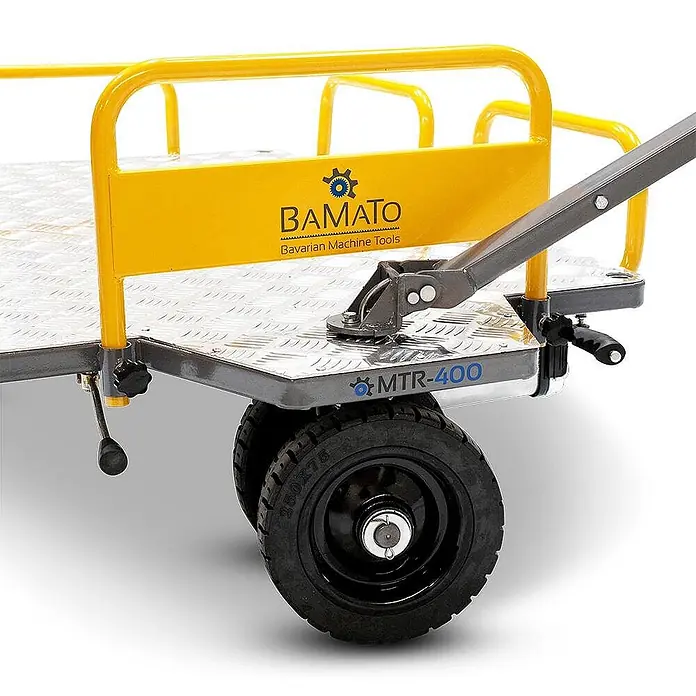 Bamato Akku-Schubkarre MTR-400 - 400 W, Traglast: 400 kg - Gelber und grauer Plattformwagen mit Riffelblechplatte und großen schwarzen Rädern.