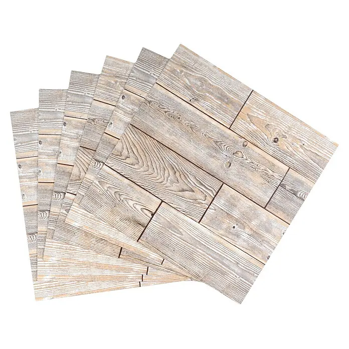 D-c-fix Bodenfliese Floor Tile Selbstklebend - 11 Stk., 30,5 x 30,5 cm, Rustic Oak - Mehrere überlappende Blätter mit hellem, gebrauchtem Holzmaserungsmuster, fächerförmig angeordnet.