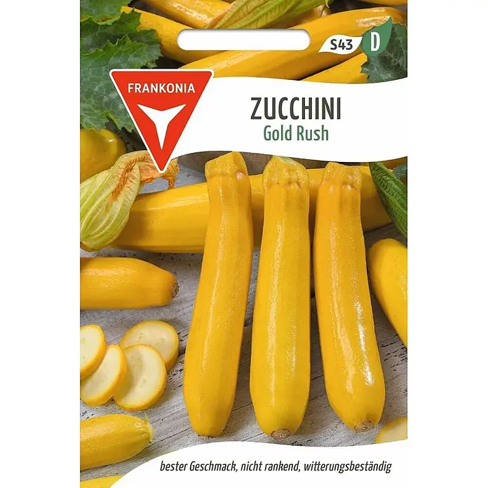 Frankonia Samen Saatgut Zucchini, Gold Rush F1 - Cucurbita pepo, 1,55 g - Leuchtend gelbe Zucchini der Sorte 'Gold Rush', ganz und geschnitten, mit Blüten.