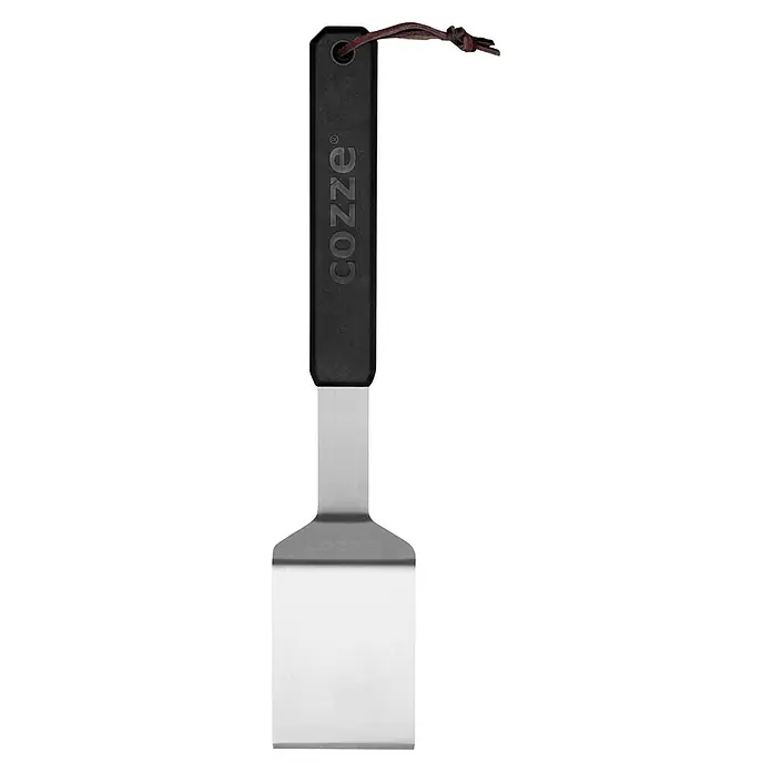 Cozze Grillgutwender - Länge: 35 cm - Edelstahl-Spachtel mit schwarzem Griff, 'COZZE'-Branding und brauner Lederschlaufe.