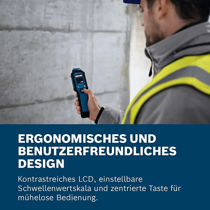 Bosch Feuchtigkeitsmessgerät GMP 1-13 - Messgenauigkeit: Umgebungstemperatur typisch: +/- 1 °C, Mit Batterien - Mann misst mit blau-schwarzem Bosch Professional Feuchtigkeitsmesser eine Betonwand.