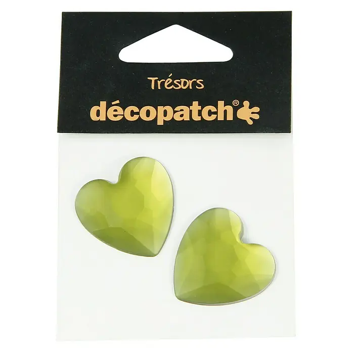 Décopatch Pieza decorativa Trésors Coeurs - 2 ud., 3 x 2 cm, Verde - Primer plano de dos corazones decorativos verdes de Décopatch en un blíster, ideales para manualidades y decoración.