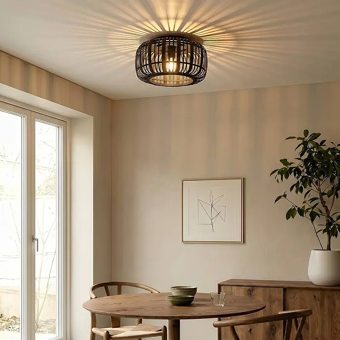 Lindby Deckenleuchte Canyana - Holz dunkel, E27 - Schwarze Deckenleuchte mit Käfigdesign, die einen Essbereich mit dekorativen Schatten beleuchtet.