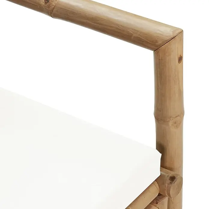 Furnicato Gartenbank Bambus - B x T x H: 115 x 65 x 72 cm, Creme - Bambus-Möbelgestell mit weißem Polster, das eine Eckverbindung zeigt.