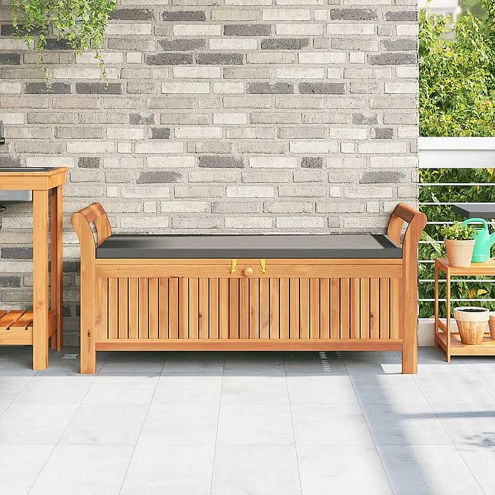 Furnicato Gartenbank Akazien-Massivholz geölt - B x T x H: 50 x 108 x 4 cm, Grau - Hölzerne Outdoor-Aufbewahrungsbank mit Lattenrost-Design und dunkelgrauem Kissen.