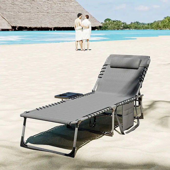 Furnicato Gartenliege - B x T: 60 x 190 cm, Grau, Kunststoff - Grauer verstellbarer Liegestuhl mit Beistelltisch, Kopfstütze und Aufbewahrungstaschen am Strand.