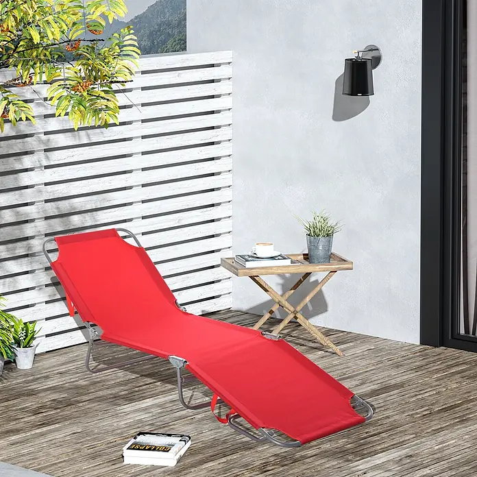Furnicato Gartenliege - B x T: 55 x 187 cm, Rot, Polyester - Roter klappbarer Liegestuhl aus Stoff und Metall, zum Entspannen auf einer Holzterrasse platziert.
