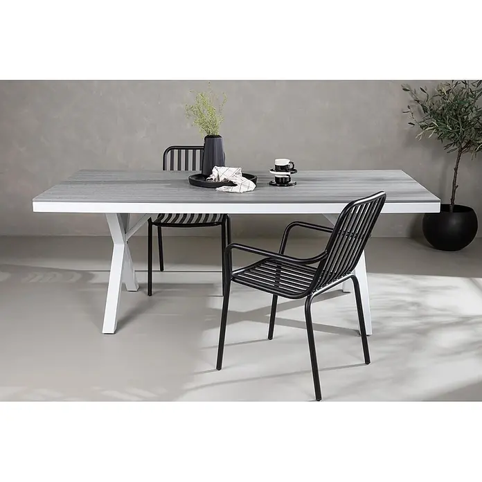 Ebuy24 Gartentisch Garcia - L x B x H: 200 x 100 x 74 cm, Ø x H: 100 x 74 cm, Nonwood, Aluminum, Grau - Modernes Essset für draußen mit weißem Gestell, grauer Tischplatte und schwarzen Lamellenstühlen aus Metall, bereit für eine Mahlzeit.