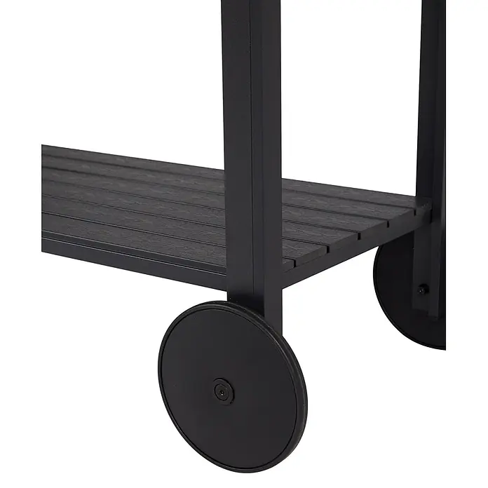 Ebuy24 Gartentisch Laust - L x B x H: 45 x 90 x 74 cm, Ø x H: 90 x 74 cm, Aluminium, Polywood, Kunststoff, Sonstige, Schwarz - Nahaufnahme eines dunkelgrauen Lamellenregals mit mattschwarzem Rahmen und Rad, Teil eines mobilen Servierwagens.