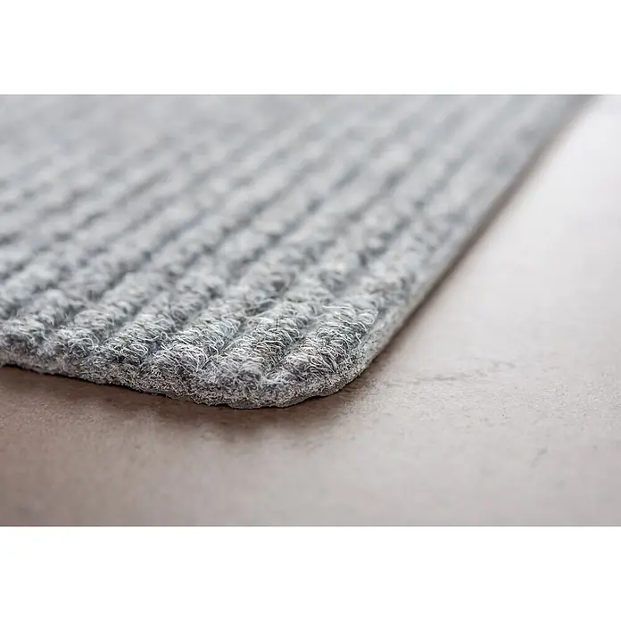 Fußmatte Rib Line Mini Sprint - 60 x 25 cm, Silber, Material Nutzschicht: 75 % Polypropylen, 25 % Polyester - Nahaufnahme einer grauen, gerippten Fußmatte mit Fasern.