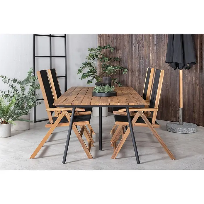 Ebuy24 Gartentisch Chan - L x B x H: 200 x 100 x 74 cm, Ø x H: 100 x 74 cm, Akazie, Stahl, Sonstige, Teak Dekor - Gartensitzgruppe: Holztisch mit schwarzen Metallbeinen und vier passenden Holzstühlen mit schwarzen Textilsitzen und -lehnen.