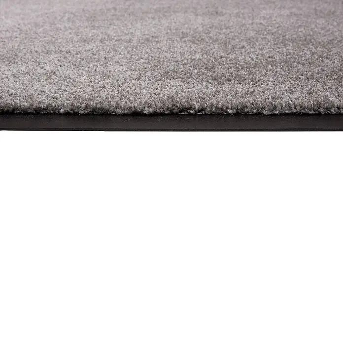 Fußmatte Miami - 70 x 50 cm, Graphit, Material Nutzschicht: 100 % Polyamid - Nahaufnahme eines grauen Teppichs oder einer Matte mit schwarzem Rand, der die Textur zeigt.