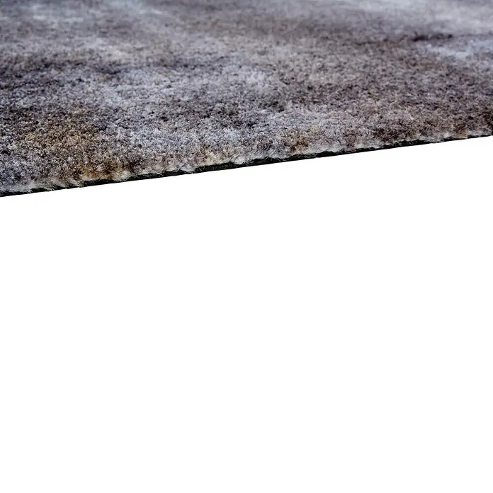 Fußmatte Manhattan - 100 x 67 cm, Anthrazit, Material Nutzschicht: 100 % Polyamid, Beton - Nahaufnahme eines zotteligen, graubraunen Teppichs mit sichtbarer Kante, der seine weiche Textur hervorhebt.