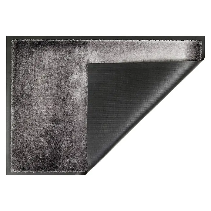 Fußmatte Miami - 70 x 50 cm, Grau, Material Nutzschicht: 100 % Polyamid, Verlauf - Grauer, texturierter Teppich mit umgeschlagener Ecke, die die dunkle, rutschfeste Unterseite zeigt.