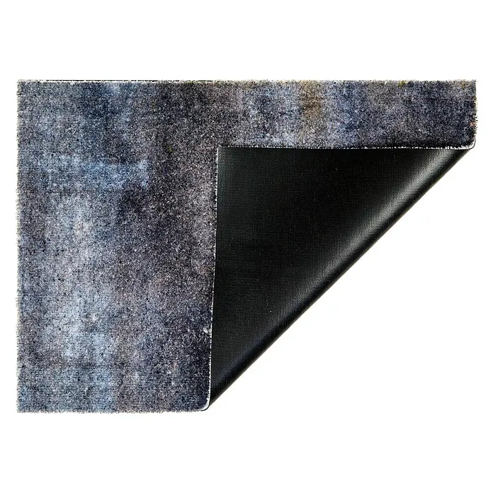 Fußmatte Orlando - 100 x 67 cm, Anthrazit, Material Nutzschicht: 100 % Polyamid, Beton - Dunkelgraue Filzmatte, eine Ecke hochgeklappt, zeigt eine schwarze, texturierte Anti-Rutsch-Unterseite.