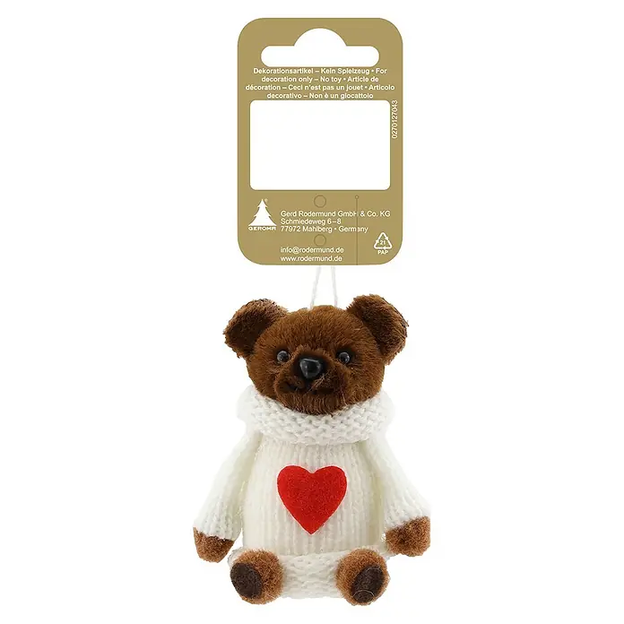Geroma Christbaumschmuck - Braun, Weiß, Rot, Textil, 1 Stk. - Kleiner brauner Teddybär-Anhänger mit weißem Strickpullover und rotem Herz, an einer Schnur hängend.