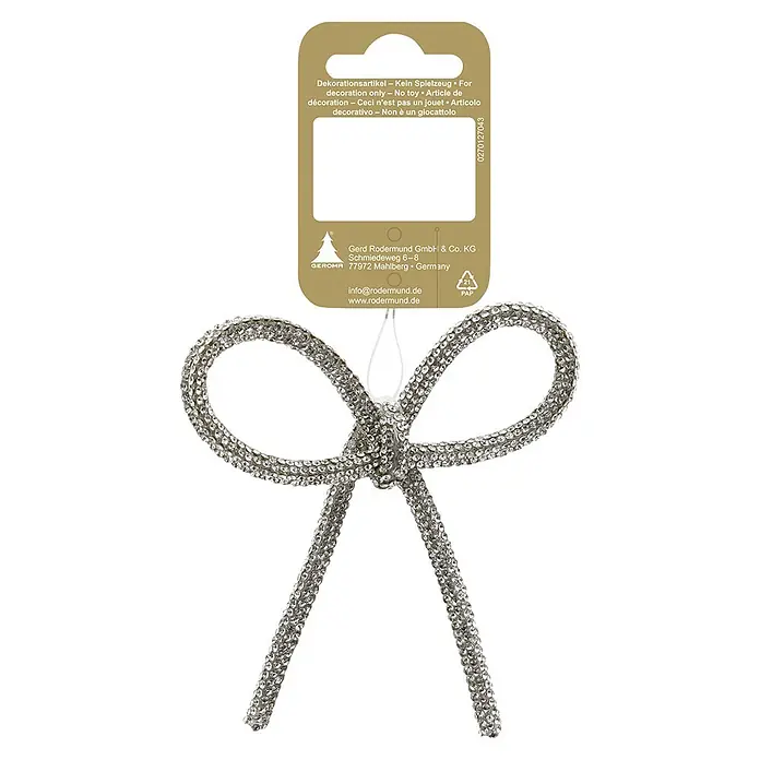 Geroma Deko-Schleife - Silber, 1 Stk. - Glitzernde silberne Schleifen-Dekoration mit Strasssteinen, an einem Produktetikett hängend.