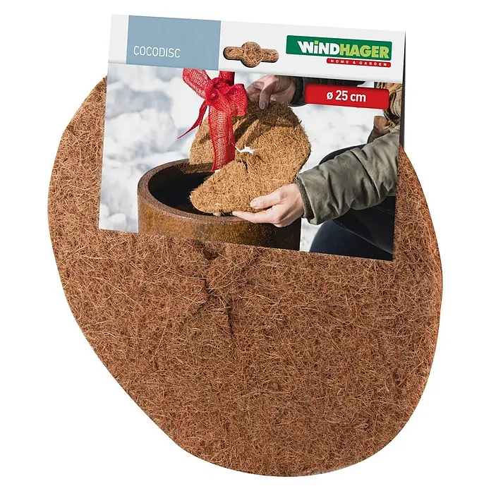 Windhager Kokosmulchscheibe Cocodisc - Durchmesser: 25 cm, Natur - Brauner Kokosfaser-Cocodisc mit Verpackung, die das Einsetzen in einen Pflanztopf zeigt, Durchmesser 25 cm.