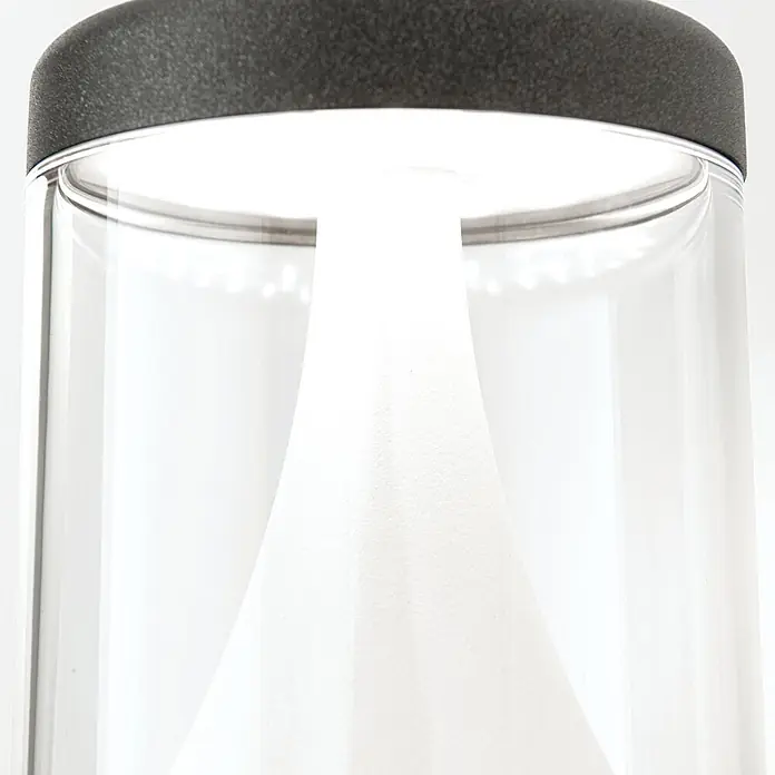 Orion Leuchten LED-Außenwandleuchte - 15,5 x 10,8 x 20 cm, IP65 - Klarer zylindrischer Spender mit dunkler, strukturierter Oberseite und weißem, papierähnlichem Material innen.